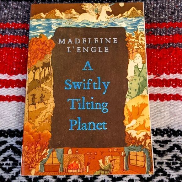 4/$10 A swiftly tilting planet by Madeleine L'engle - Picture 1 of 3